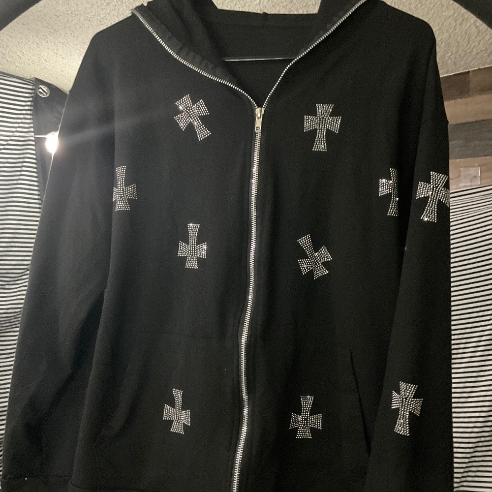 Black jacket with rhinestone crosses